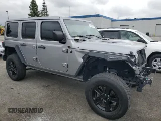 2018 Jeep Wrangler Unlimited Rubicon with VIN 1C4HJXFN7JW211402, listed as a Copart auction lot 53401925 with 79,041 mi miles and Salvage title. Bid and sale history available at DreamBid. Image 4.