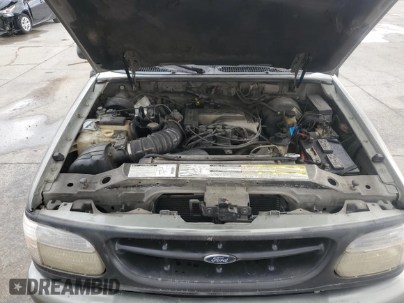 2000 Ford Explorer z VIN 1FMDU65P9YUB42443, wystawiony jako Copart lot #70036074 z przebiegiem 175 479 mil mil oraz Szkoda całkowita • Salvage title. Historia ofert i sprzedaży dostępna na DreamBid. Obrazek 11.