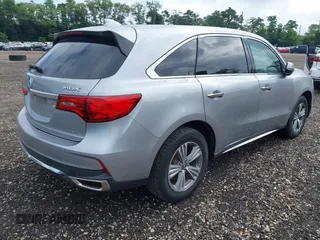 2020 Acura MDX with VIN 5J8YD4H39LL003853, listed as a IAAI auction lot 42731495 with 112,975 mi miles and . Bid and sale history available at DreamBid. Image 4.