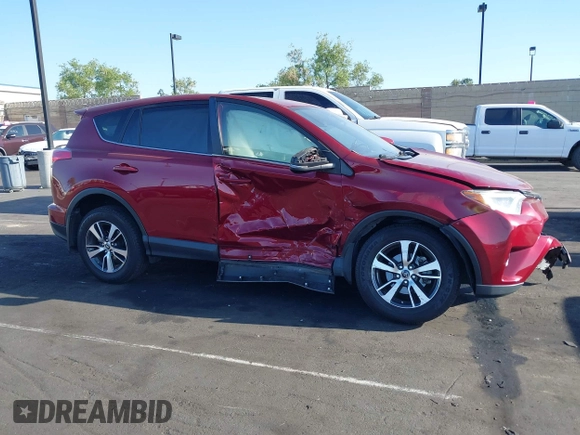 2018 Toyota RAV4 XLE with VIN JTMWFREV6JD117500, listed as a IAAI auction lot 42258588 with Not provided miles and . Bid and sale history available at DreamBid. Image 14.