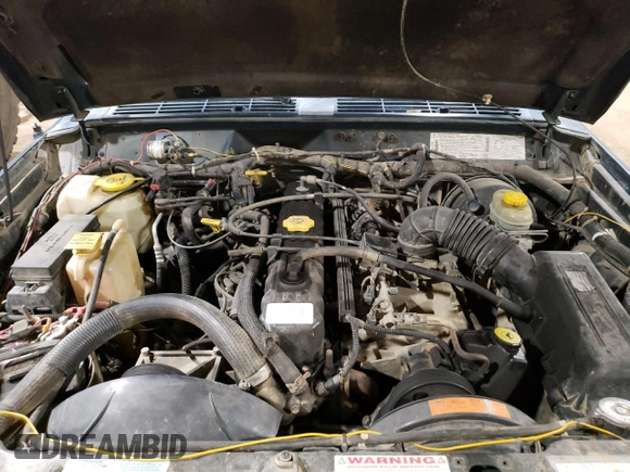 1996 Jeep Cherokee Sport with VIN 1J4FJ68S1TL226495, listed as a Copart auction lot 58587685 with 205,397 mi miles and Salvage title. Bid and sale history available at DreamBid. Image 12.