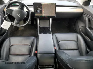 2019 Tesla Model 3 Mid Range with VIN 5YJ3E1EAXKF305080, listed as a Copart auction lot 49899965 with 88,607 mi miles and Salvage Title. Bid and sale history available at DreamBid. Image 8.