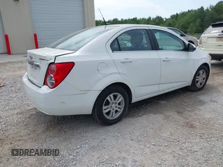 2012 Chevrolet Sonic LT with VIN 1G1JC5SH1C4126756, listed as a IAAI auction lot 42868558 with 163,633 mi miles and . Bid and sale history available at DreamBid. Image 4.