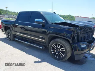 2018 GMC Sierra 1500 Denali z VIN 3GTU2PEJXJG310014, wystawiony jako IAAI lot #42223909 z przebiegiem 135 543 mil mil oraz . Historia ofert i sprzedaży dostępna na DreamBid. Obrazek 1.
