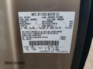 2004 Ford F-150 STX with VIN 1FTRX14W44NC37543, listed as a Copart auction lot 57442095 with 201,071 mi miles and Salvage title. Bid and sale history available at DreamBid. Image 12.