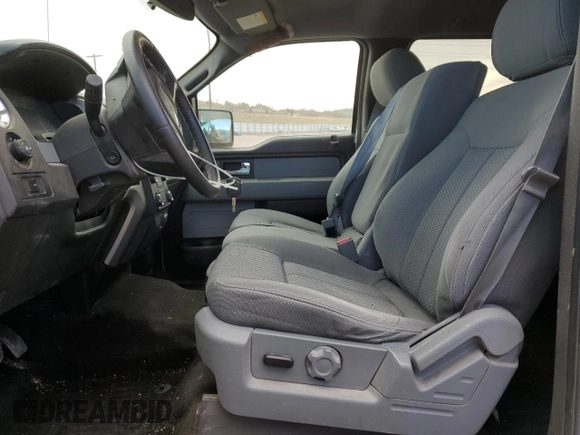 2014 Ford F-150 XL with VIN 1FTFW1ET2EFB47717, listed as a Copart auction lot 49323155 with 141,969 mi miles and Salvage title. Bid and sale history available at DreamBid. Image 7.