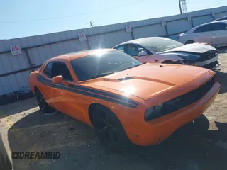 2014 Dodge Challenger R/T z VIN 2C3CDYBT1EH206684, wystawiony jako IAAI lot #41632433 z przebiegiem 126 848 mil mil oraz . Historia ofert i sprzedaży dostępna na DreamBid. Obrazek 1.