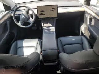 2023 Tesla Model Y Long Range z VIN 7SAYGDEE8PA030286, wystawiony jako Copart lot #50945465 z przebiegiem 43 676 mil mil oraz Szkoda całkowita • Salvage title. Historia ofert i sprzedaży dostępna na DreamBid. Obrazek 8.