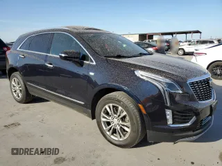 2021 Cadillac XT5 FWD Premium Luxury with VIN 1GYKNCRS5MZ138712, listed as a Copart auction lot 49697945 with 54,893 mi miles and Salvage Title. Bid and sale history available at carsss.com. Image 4.