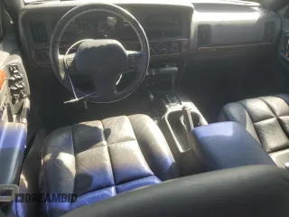 1998 Jeep Grand Cherokee Limited with VIN 1J4GZ78S5WC325148, listed as a Copart auction lot 67780424 with 0 mi miles and Salvage Title. Bid and sale history available at carsss.com. Image 8.