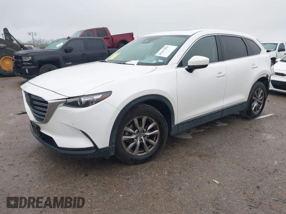 2019 Mazda CX-9 Touring with VIN JM3TCACY2K0328347, listed as a IAAI auction lot 41917854 with 67,173 mi miles and . Bid and sale history available at DreamBid. Image 18.