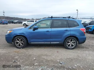 2015 Subaru Forester 2.5i Touring with VIN JF2SJAWC9FH415634, listed as a IAAI auction lot 41954673 with 140,507 mi miles. Bid and sale history available at carsss.com. Image 13.