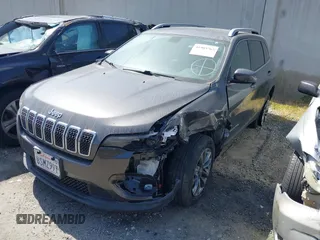 2020 Jeep Cherokee Latitude Plus z VIN 1C4PJLLB9LD605920, wystawiony jako IAAI lot #41905767 z przebiegiem 63 826 mil mil oraz . Historia ofert i sprzedaży dostępna na DreamBid. Obrazek 18.
