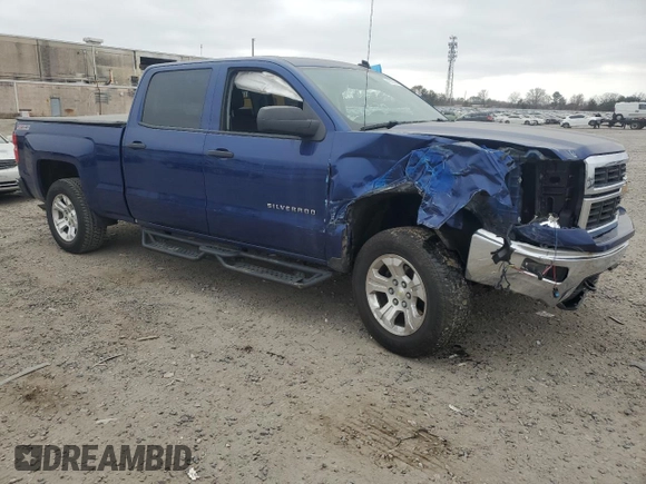 2014 Chevrolet Silverado 1500 LT with VIN 1GCUKREC3EF195504, listed as a Copart auction lot 49352085 with 128,235 mi miles and Salvage Title. Bid and sale history available at DreamBid. Image 4.