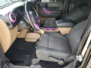 2012 Jeep Wrangler Unlimited Sahara with VIN 1C4BJWEG4CL120370, listed as a Copart auction lot 58744135 with 166,455 mi miles and Clean title. Bid and sale history available at DreamBid. Image 7.
