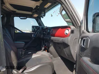 2022 Jeep Gladiator Rubicon z VIN 1C6JJTBG2NL167034, wystawiony jako IAAI lot #41854225 z przebiegiem Nie podano mil oraz . Historia ofert i sprzedaży dostępna na DreamBid. Obrazek 5.