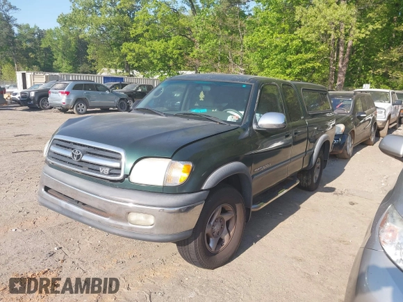 2000 Toyota Tundra SR5 with VIN 5TBBT4412YS082390, listed as a IAAI auction lot 42069302 with Not Provided miles and . Bid and sale history available at DreamBid. Image 2.