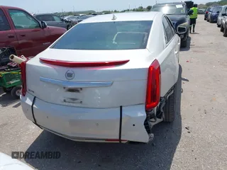 2013 Cadillac XTS Premium z VIN 2G61S5S33D9235025, wystawiony jako IAAI lot #42288742 z przebiegiem 180 221 mil mil oraz . Historia ofert i sprzedaży dostępna na DreamBid. Obrazek 16.