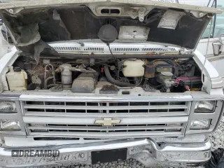1991 Chevrolet Chevy Van z VIN 1GBEG25K9M7125247, wystawiony jako Copart lot #75549674 z przebiegiem 108 756 mil mil oraz Czysty tytuł • Clean title. Historia ofert i sprzedaży dostępna na DreamBid. Obrazek 12.