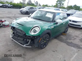 2021 MINI Hardtop Cooper SE with VIN WMWXP3C06M2N26986, listed as a IAAI auction lot 42023528 with 39,068 mi miles and . Bid and sale history available at DreamBid. Image 2.