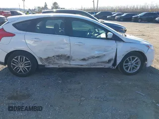 2012 Ford Focus SE z VIN 1FAHP3K29CL265135, wystawiony jako IAAI lot #40989480 z przebiegiem 158 742 mil mil oraz . Historia ofert i sprzedaży dostępna na DreamBid. Obrazek 6.