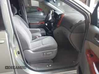 2007 Toyota Sienna XLE with VIN 5TDZK22C37S023719, listed as a IAAI auction lot 41566286 with 239,296 mi miles. Bid and sale history available at carsss.com. Image 5.