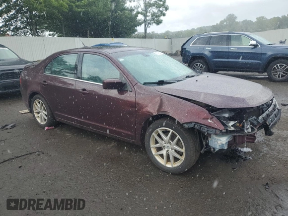 2012 Ford Fusion SEL with VIN 3FAHP0JG1CR358874, listed as a Copart auction lot 86041954 with 59,964 mi miles and Salvage Title. Bid and sale history available at DreamBid. Image 4.