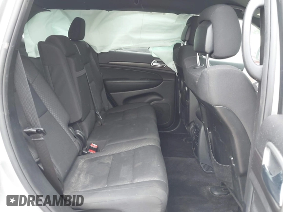 2018 Jeep Grand Cherokee Laredo z VIN 1C4RJFAG0JC129021, wystawiony jako IAAI lot #42413165 z przebiegiem 103 743 mil mil oraz . Historia ofert i sprzedaży dostępna na DreamBid. Obrazek 7.