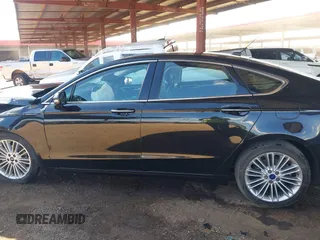 2014 Ford Fusion SE Hybrid with VIN 3FA6P0LUXER291754, listed as a IAAI auction lot 42415936 with 154,474 mi miles and . Bid and sale history available at DreamBid. Image 14.