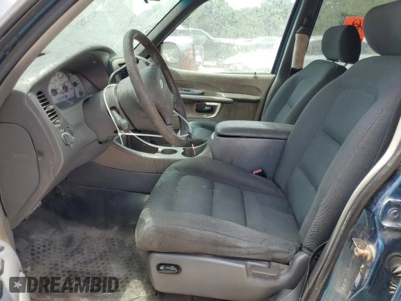 2001 Ford Explorer Sport Trac with VIN 1FMZU67E91UB88054, listed as a Copart auction lot 58401815 with 229,263 mi miles and Clean title. Bid and sale history available at DreamBid. Image 7.