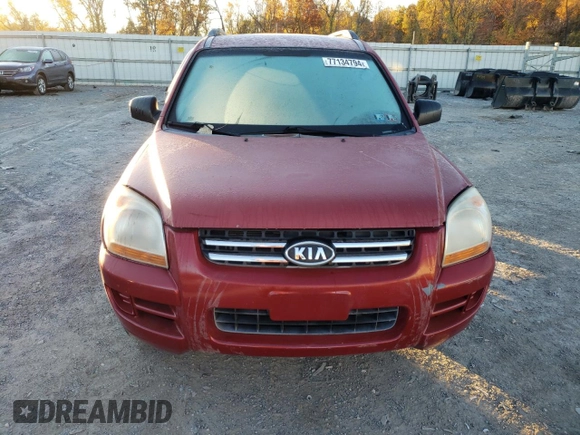 2005 Kia Sportage LX with VIN KNDJE723X57054667, listed as a Copart auction lot 77134794 with 159,748 mi miles and Salvage Title. Bid and sale history available at carsss.com. Image 5.
