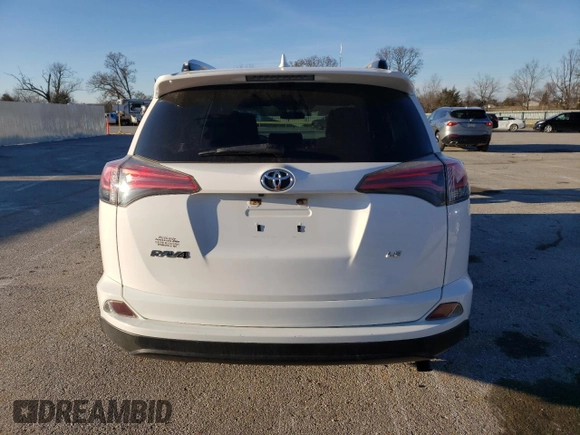 2016 Toyota RAV4 LE with VIN JTMZFREV7GJ089388, listed as a Copart auction lot 85863754 with 102,395 mi miles and Salvage Title. Bid and sale history available at DreamBid. Image 6.