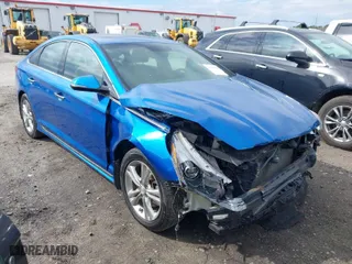 2019 Hyundai Sonata Sport with VIN 5NPE34AF2KH735382, listed as a IAAI auction lot 41815754 with 136,432 mi miles. Bid and sale history available at carsss.com. Image 1.