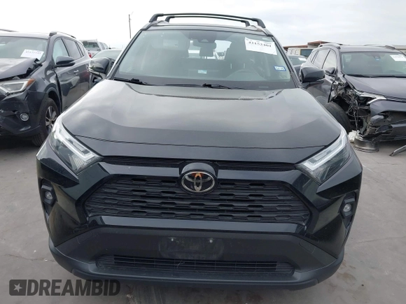 2022 Toyota RAV4 XLE Premium with VIN JTMC1RFV0ND085813, listed as a IAAI auction lot 42152401 with 86,707 mi miles and . Bid and sale history available at DreamBid. Image 12.