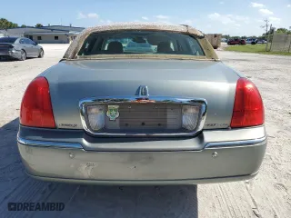 2004 Lincoln Town Car Signature with VIN 1LNHM81W64Y644937, listed as a Copart auction lot 50868815 with 189,886 mi miles and Salvage Title. Bid and sale history available at carsss.com. Image 6.