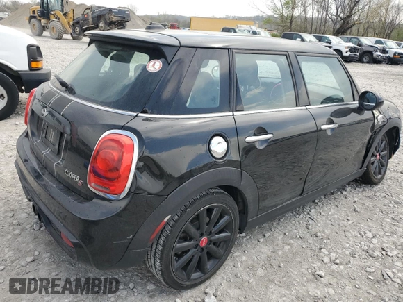 2016 MINI Hardtop 4 Door S z VIN WMWXU3C51G2B67610, wystawiony jako Copart lot #52743005 z przebiegiem 160 434 mil mil oraz Szkoda całkowita • Salvage title. Historia ofert i sprzedaży dostępna na DreamBid. Obrazek 3.