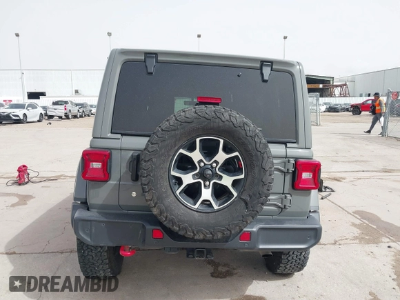 2020 Jeep Wrangler Unlimited Rubicon z VIN 1C4HJXFG2LW267154, wystawiony jako IAAI lot #41745497 z przebiegiem 28 692 mil mil oraz . Historia ofert i sprzedaży dostępna na DreamBid. Obrazek 17.