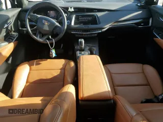 2019 Cadillac XT4 FWD Premium Luxury with VIN 1GYFZCR46KF117955, listed as a Copart auction lot 62145385 with 10,474 mi miles and Salvage title. Bid and sale history available at DreamBid. Image 8.