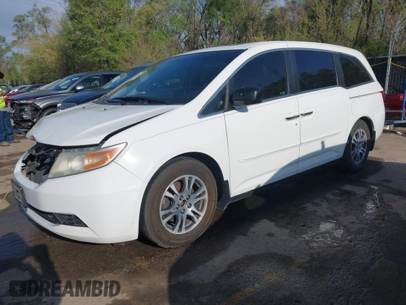 2012 Honda Odyssey EX-L with VIN 5FNRL5H62CB010054, listed as a IAAI auction lot 42040117 with 189,566 mi miles and . Bid and sale history available at carsss.com. Image 20.