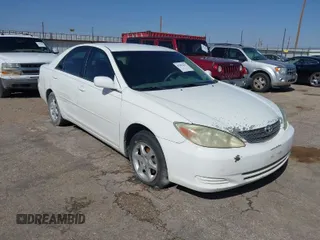 2004 Toyota Camry LE with VIN 4T1BE32K04U311979, listed as a IAAI auction lot 41981433 with 312,582 mi miles. Bid and sale history available at carsss.com. Image 1.