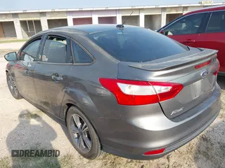 2014 Ford Focus SE with VIN 1FADP3F24EL320991, listed as a IAAI auction lot 41932638 with 133,163 mi miles. Bid and sale history available at carsss.com. Image 3.