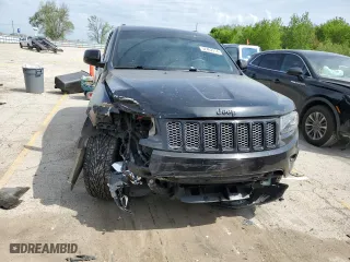 2015 Jeep Grand Cherokee Laredo with VIN 1C4RJFAG5FC724874, listed as a Copart auction lot 52462214 with 99,650 mi miles and Salvage Title. Bid and sale history available at carsss.com. Image 5.