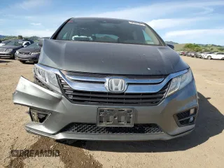 2018 Honda Odyssey EX-L with VIN 5FNRL6H76JB010103, listed as a Copart auction lot 52965965 with 129,837 mi miles and Salvage Title. Bid and sale history available at carsss.com. Image 5.