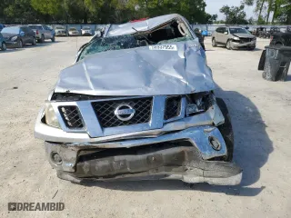2009 Nissan Frontier SE with VIN 1N6AD06U09C428159, listed as a Copart auction lot 50937955 with 117,916 mi miles and Salvage Title. Bid and sale history available at carsss.com. Image 5.