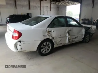 2002 Toyota Camry LE z VIN 4T1BE32K82U108626, wystawiony jako Copart lot #59215024 z przebiegiem Nie podano mil oraz Szkoda całkowita • Salvage title. Historia ofert i sprzedaży dostępna na DreamBid. Obrazek 3.