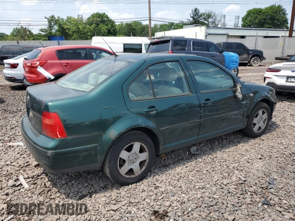 2001 Volkswagen Jetta with VIN 3VWST29M31M013547, listed as a Copart auction lot 60316525 with 156,596 mi miles and Salvage title. Bid and sale history available at DreamBid. Image 3.
