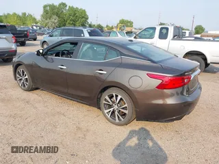 2016 Nissan Maxima SV with VIN 1N4AA6AP9GC384035, listed as a IAAI auction lot 42856838 with 116,736 mi miles and . Bid and sale history available at DreamBid. Image 3.