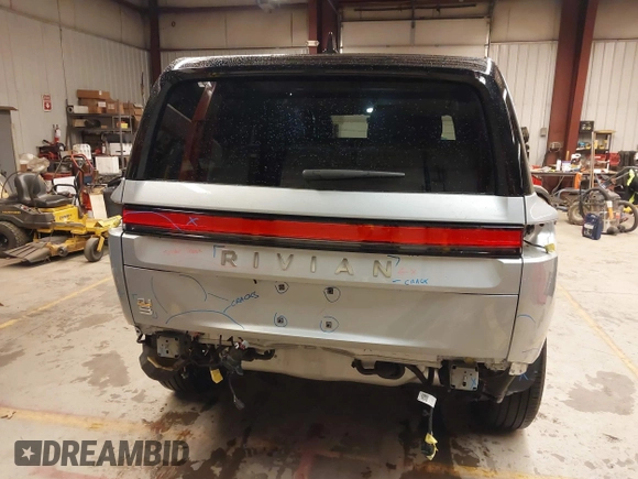 2024 Rivian R1S Adventure with VIN 7PDSGABA9RN039601, listed as a IAAI auction lot 40862472 with 6,186 mi miles. Bid and sale history available at carsss.com. Image 20.