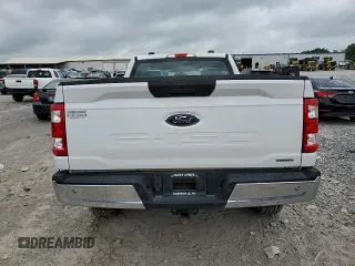 2021 Ford F-150 XL with VIN 1FTMF1EP7MKE72931, listed as a Copart auction lot 60650605 with 23,825 mi miles and Salvage title. Bid and sale history available at DreamBid. Image 6.