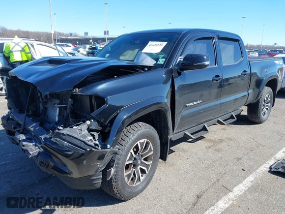 2021 Toyota Tacoma 4WD SR5 with VIN 3TMDZ5BN4MM117564, listed as a IAAI auction lot 41629220 with 77,063 mi miles. Bid and sale history available at carsss.com. Image 18.